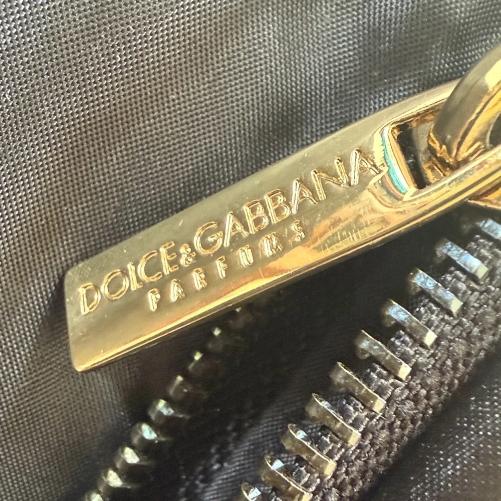 DOLCE and GABBANA PARFUMS ladies Black wristlet excellent condition silky feel